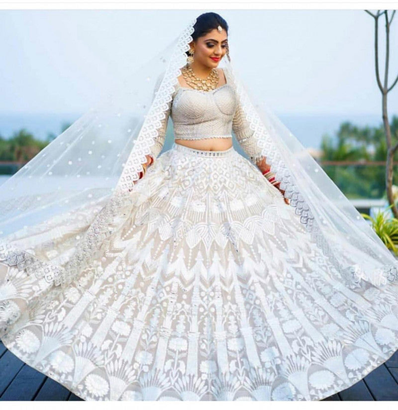 Presenting White Color Wedding Wear Lehenga Choli