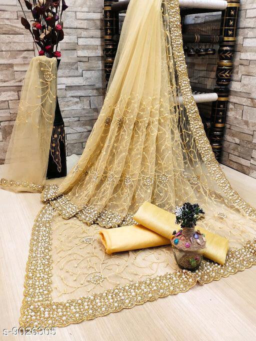 Beautiful Beige Color Heavy Trendy And Jari Work Net Saree