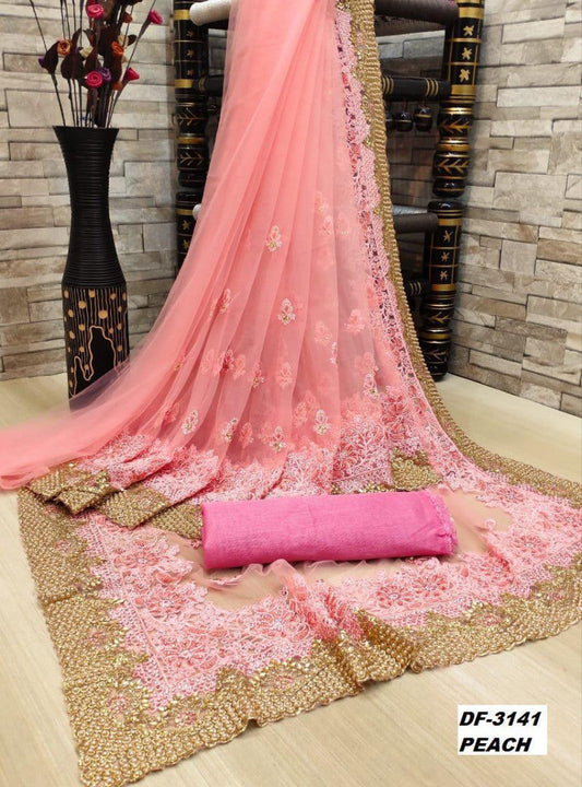 Precious Luxuriant Extra Ordinary Peach Color Heavy Trendy Net Saree