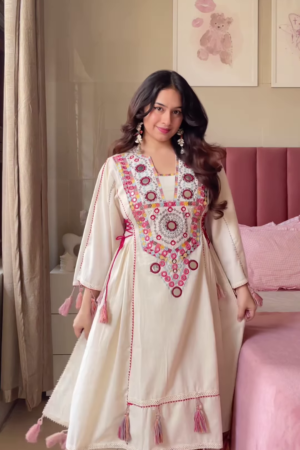 Women’s Cream Embroidered Long Kurti with Multicolor Circular Motifs and Tassel Accents – Heritage-Inspired Ethnicwear Portrait